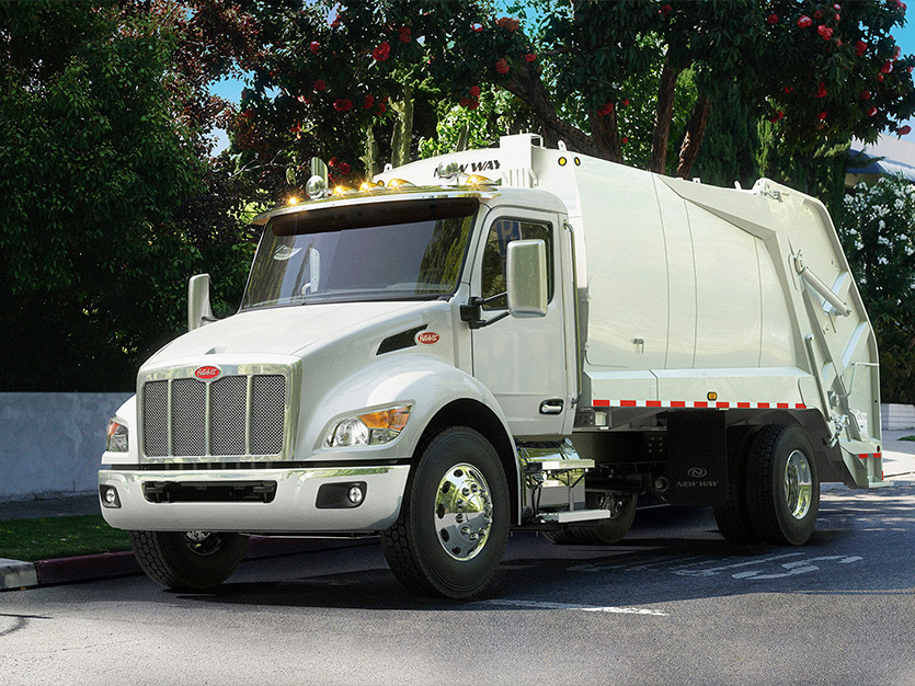 Peterbilt 548 refuse truck with a New Way rear loader